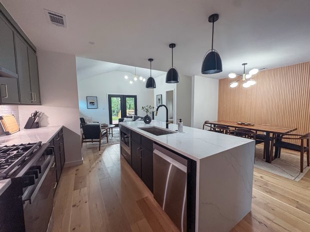 Sightline from the kitchen through the dining area to the living room