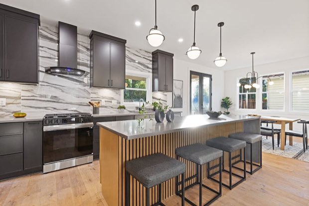 Kitchen island with pendant lighting and counter seating