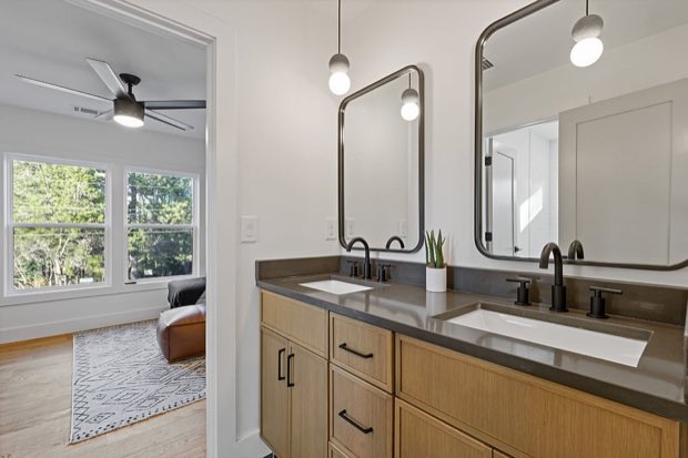 Second double vanity with framed mirrors