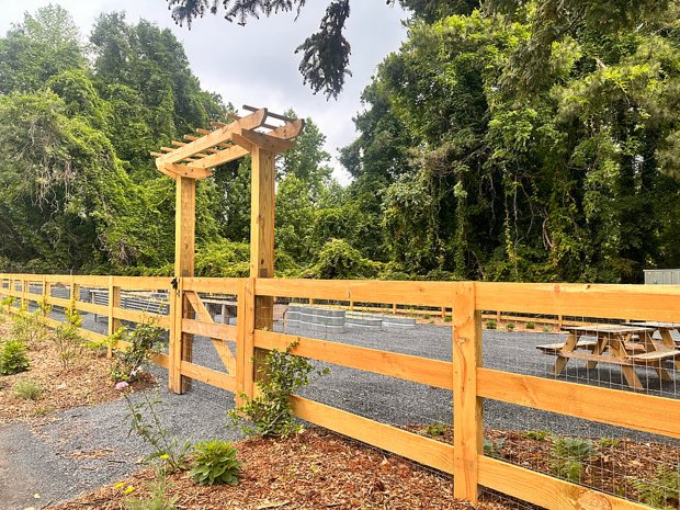 Arbor entrance to the community garden across the street