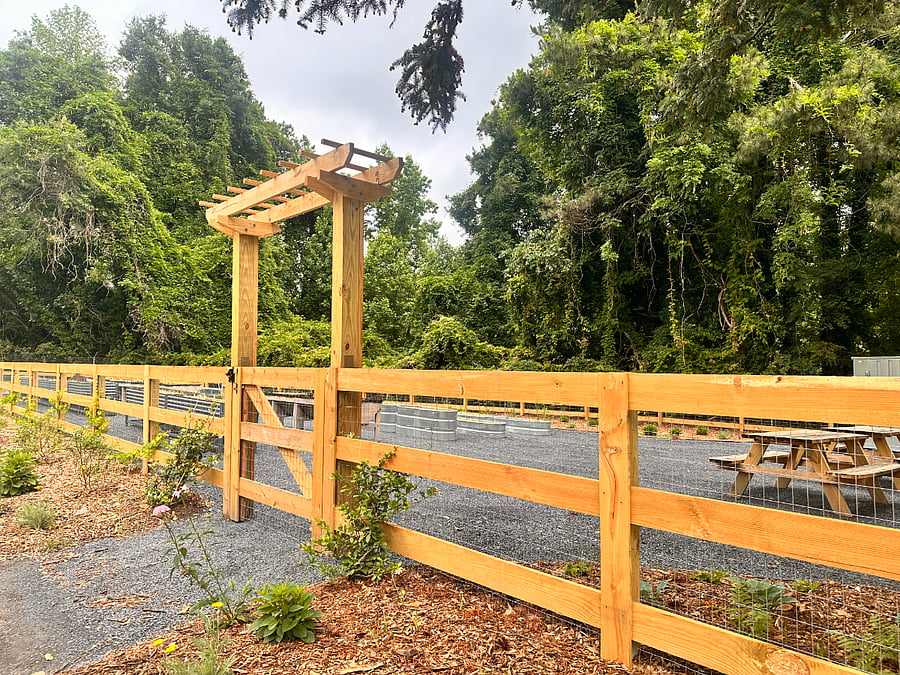 Arbor entrance to the community garden across the street
